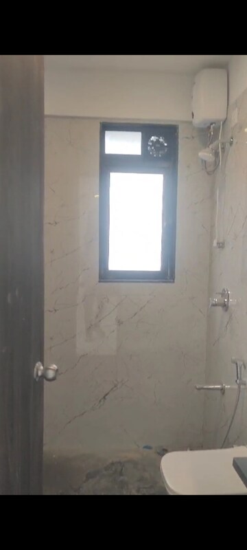 Bathroom in 2 BHK Apartment at Dev Leo Tower, Oshiwara – for Rent