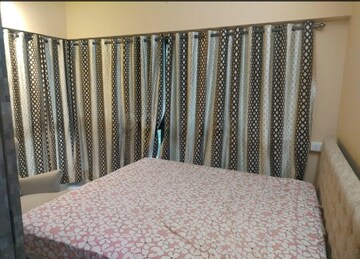Bedroom in 2 BHK Apartment at Kanakia Rainforest, Andheri East – for Rent