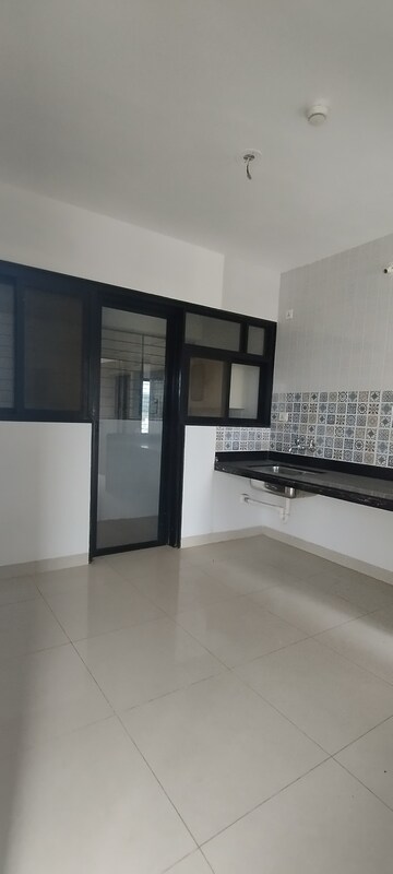 Kitchen in 2 BHK Apartment at Nanded City Pancham, Nanded – for Rent