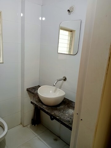 Bathroom in 2 BHK Apartment at Shreeji Splendor, Brahmand – for Sale
