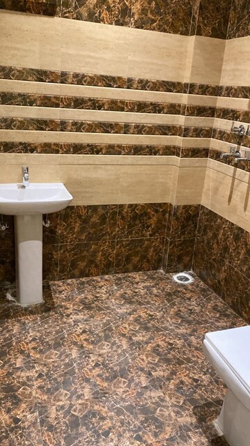 Bathroom in 3 BHK Apartment at Dilshad Garden – for Sale