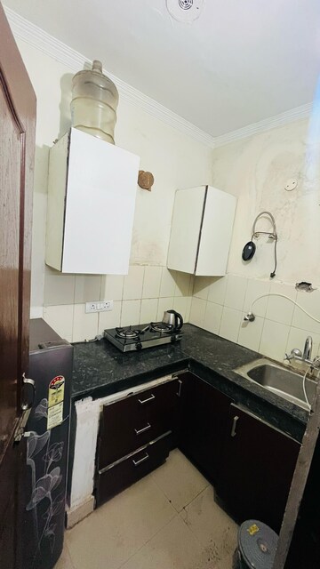 Kitchen in Studio Apartment at Maya Garden City, Lohgarh – for Rent
