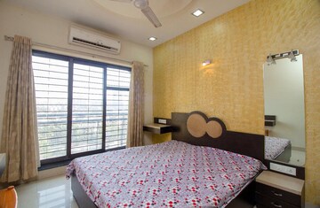 Bedroom in 2 BHK Apartment at K Raheja Heights, Malad East – for Rent