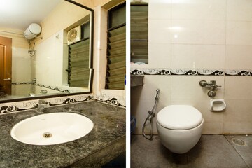 Bathroom in 2 BHK Apartment at K Raheja Heights, Malad East – for Rent