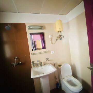 Bathroom in 3 BHK Apartment at Aims Golf Avenue II, Sector 75 – for Rent