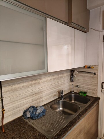 Kitchen in 3 BHK Apartment at ABA Cleo County, Sector 121 – for Rent