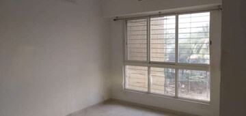 Living Room in 1 BHK Apartment at Lodha Amara, Kolshet Road – for Rent