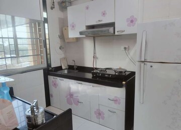 Kitchen in 2 BHK Apartment at Vasant Fiona, Pokhran Road No 2 – for Rent
