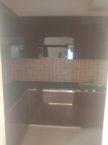 Kitchen in 2.5 BHK Apartment at Mahagun Mywoods, Sector 16c Greater Noida – for Rent