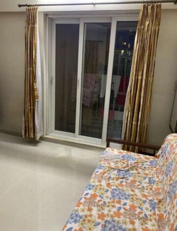 Living Room in 2 BHK Apartment at Dosti Group Imperia, Manpada – for Rent