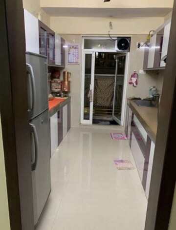 Kitchen in 2 BHK Apartment at Dosti Group Imperia, Manpada – for Rent