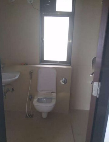 Bathroom in 3 BHK Apartment at Runwal Pearl, Manpada – for Rent