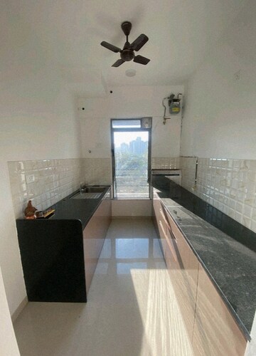 Kitchen in 2 BHK Apartment at Kalpataru Immensa, Kolshet Road – for Rent