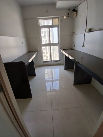 Kitchen in 3 BHK Apartment at Godrej Emerald, Ghodbunder Road – for Sale