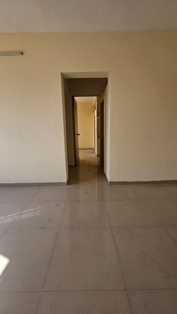 Living Room in 1 BHK Apartment at Unique Aurum, Mira Road – for Sale