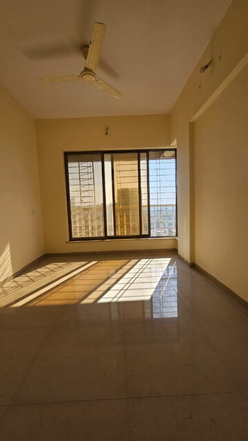 Master Bedroom in 1 BHK Apartment at Unique Aurum, Mira Road – for Sale