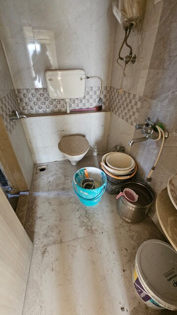 Bathroom in 1 BHK Apartment at Unique Aurum, Mira Road – for Sale