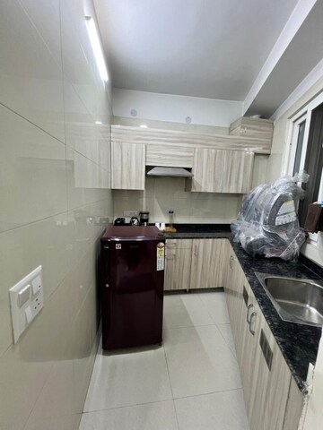 Kitchen in 4 BHK Builder Floor at Adani Samsara Vilasa, Sector 63 – for Sale