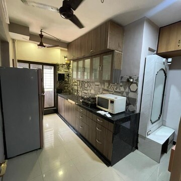 Kitchen in 2 BHK Apartment at Milton Apartment, Chandrabai Nagar – for Rent