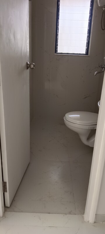 Bathroom in 2 BHK Apartment at Runwal Gardens, Dombivli East – for Rent