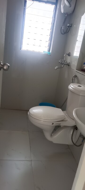 Bathroom in 1 BHK Apartment at Runwal Gardens, Dombivli East – for Rent
