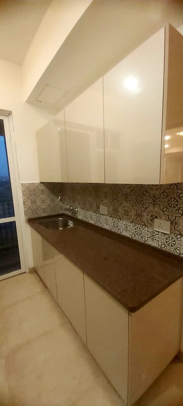 Kitchen in 4 BHK Apartment at Suraj Oranje Castle, Gomti Nagar – for Sale