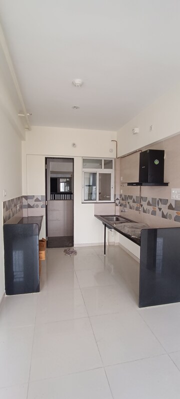 Kitchen in 2.5 BHK Apartment at Kolte Patil Life Republic, Hinjewadi – for Rent