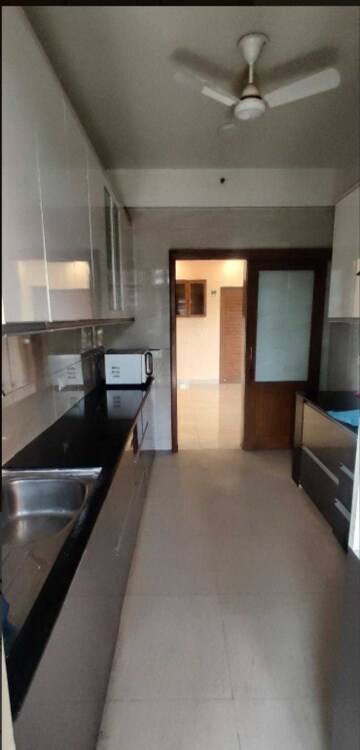 Kitchen in 2 BHK Apartment at Shree Vardhman Green Court, Sector 90 – for Rent
