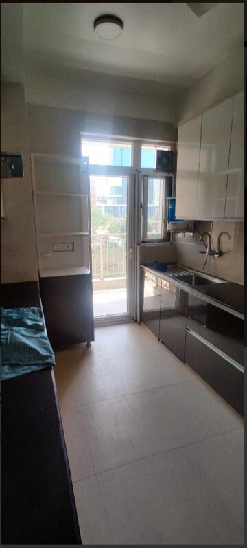 Kitchen in 2 BHK Apartment at Shree Vardhman Green Court, Sector 90 – for Rent