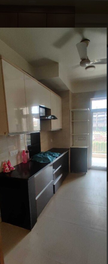 Kitchen in 2 BHK Apartment at Shree Vardhman Green Court, Sector 90 – for Rent