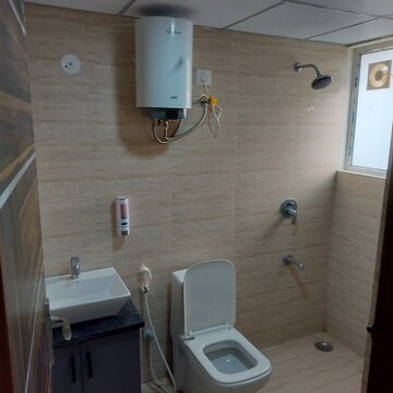 Bathroom in Studio Apartment at Okay Plus Solitaire Suites, Ramnagariya – for Rent