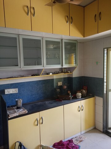 Kitchen in 2 BHK Apartment at Omkar CHS Mulund, Mulund East – for Rent