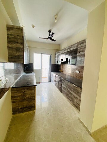 Kitchen in 3 BHK Apartment at Amrapali Silicon City, Sector 76 – for Rent