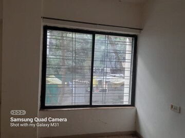 Room in 2 BHK Apartment at Atharva Garden, Kharadi – for Rent