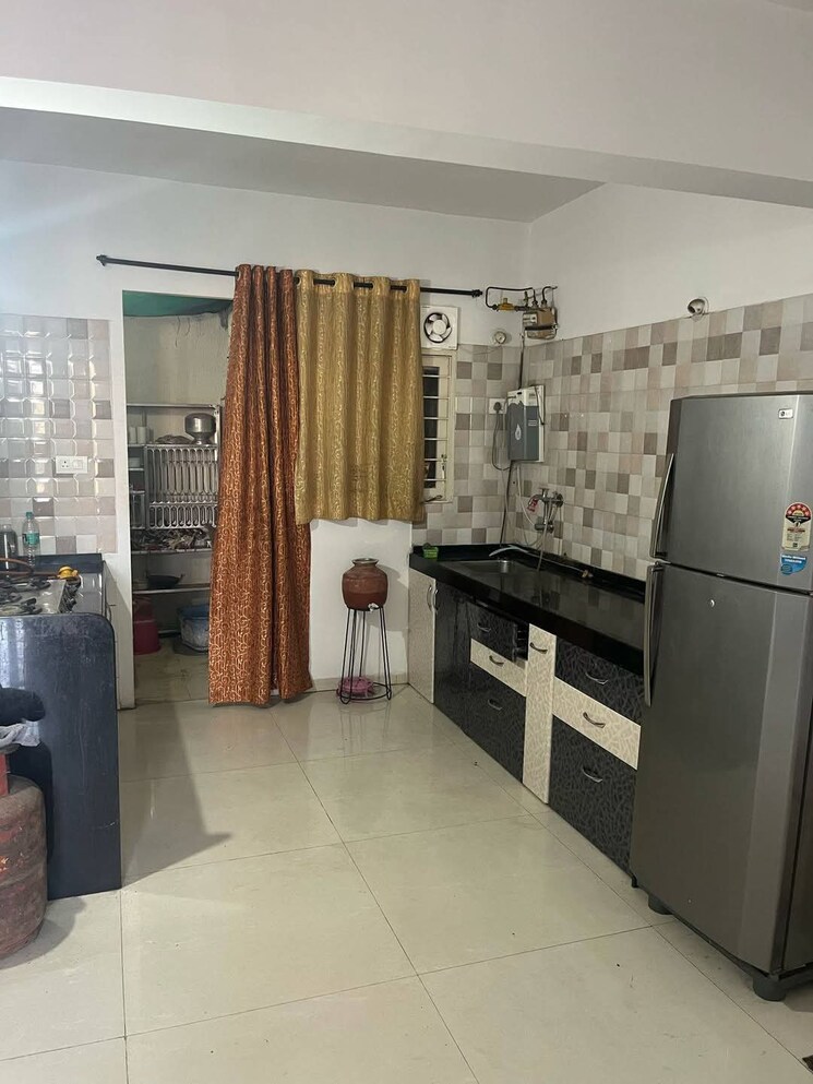 Kitchen, shriram-la-tierra 2 Bedroom 1000 Sq.Ft. Apartment In Vishrantwadi Pune 8213626