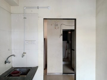 Kitchen in 2 BHK Apartment at New Vegas Plaza, Owale – for Sale