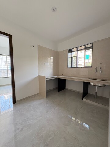 Kitchen in 1 BHK Apartment at Wadgaon Sheri – for Sale