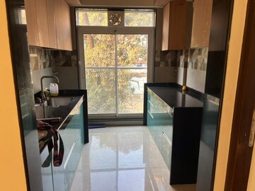 Kitchen in 2 BHK Apartment at Raheja Complex, Malad East – for Rent