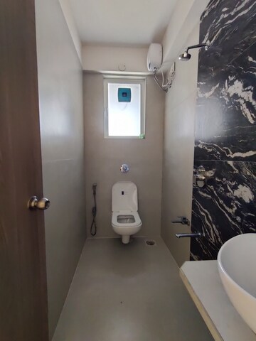 Bathroom in 2 BHK Apartment at Unique Ivana, Mira Road – for Rent