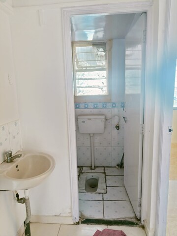 Bathroom in 1 BHK Apartment at Punyadham Society, Wadgaon Sheri – for Rent