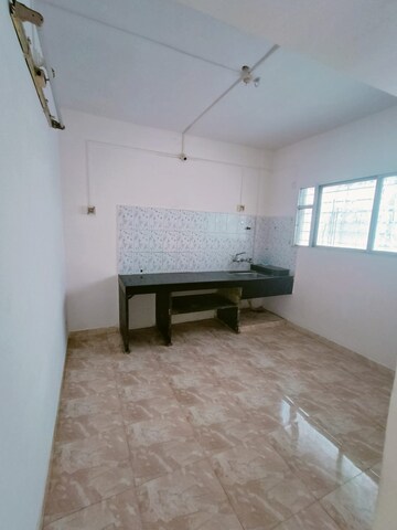 Kitchen in 1 BHK Apartment at Punyadham Society, Wadgaon Sheri – for Rent