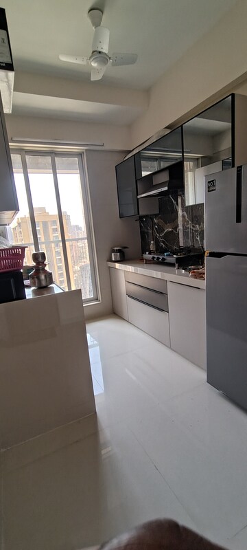Kitchen in 2 BHK Apartment at Unique Ivana, Mira Road – for Rent