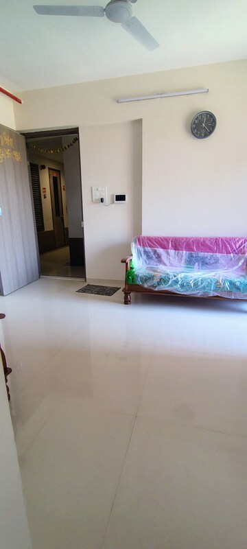 Living Room in 2 BHK Apartment at Unique Ivana, Mira Road – for Rent