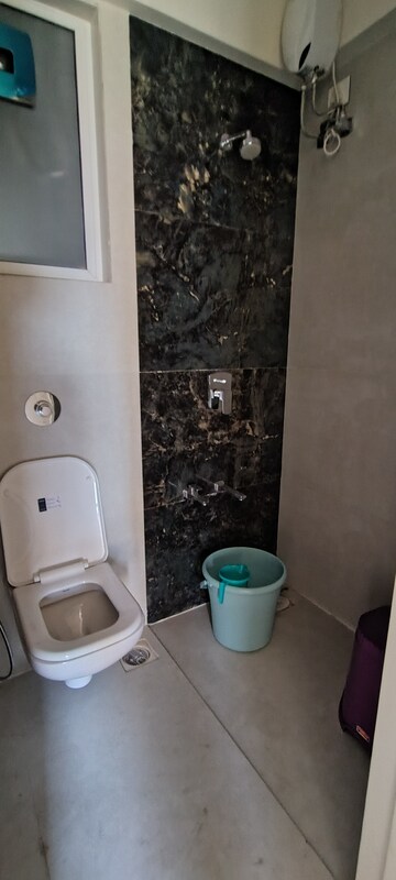 Bathroom in 2 BHK Apartment at Unique Ivana, Mira Road – for Rent
