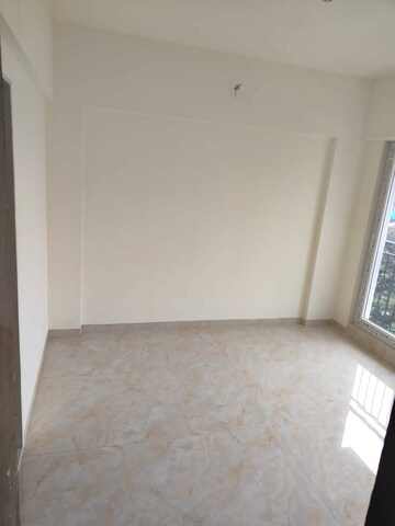Room in 2 BHK Apartment at Sri Arthaya, Kandivali West – for Sale