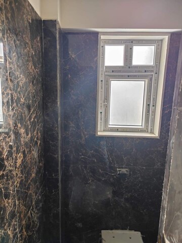 Room in 2 BHK Apartment at Sri Arthaya, Kandivali West – for Sale