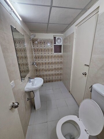 Bathroom in 3 BHK Apartment at Mahagun Mywoods, Sector 16c Greater Noida – for Rent