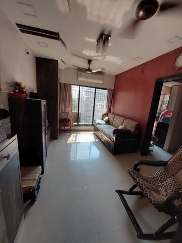 Living Room in 1 BHK Apartment at Chincholi Apartment, Malad West – for Rent
