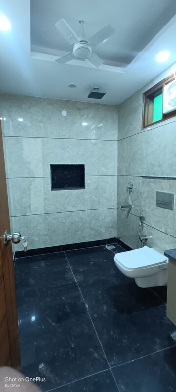 Bathroom in 4 BHK Apartment at Dwarka Sector 12 – for Rent