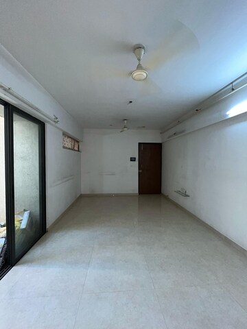 Living Room in 2 BHK Apartment at Lodha Lakeshore Greens, Dombivli East – for Rent